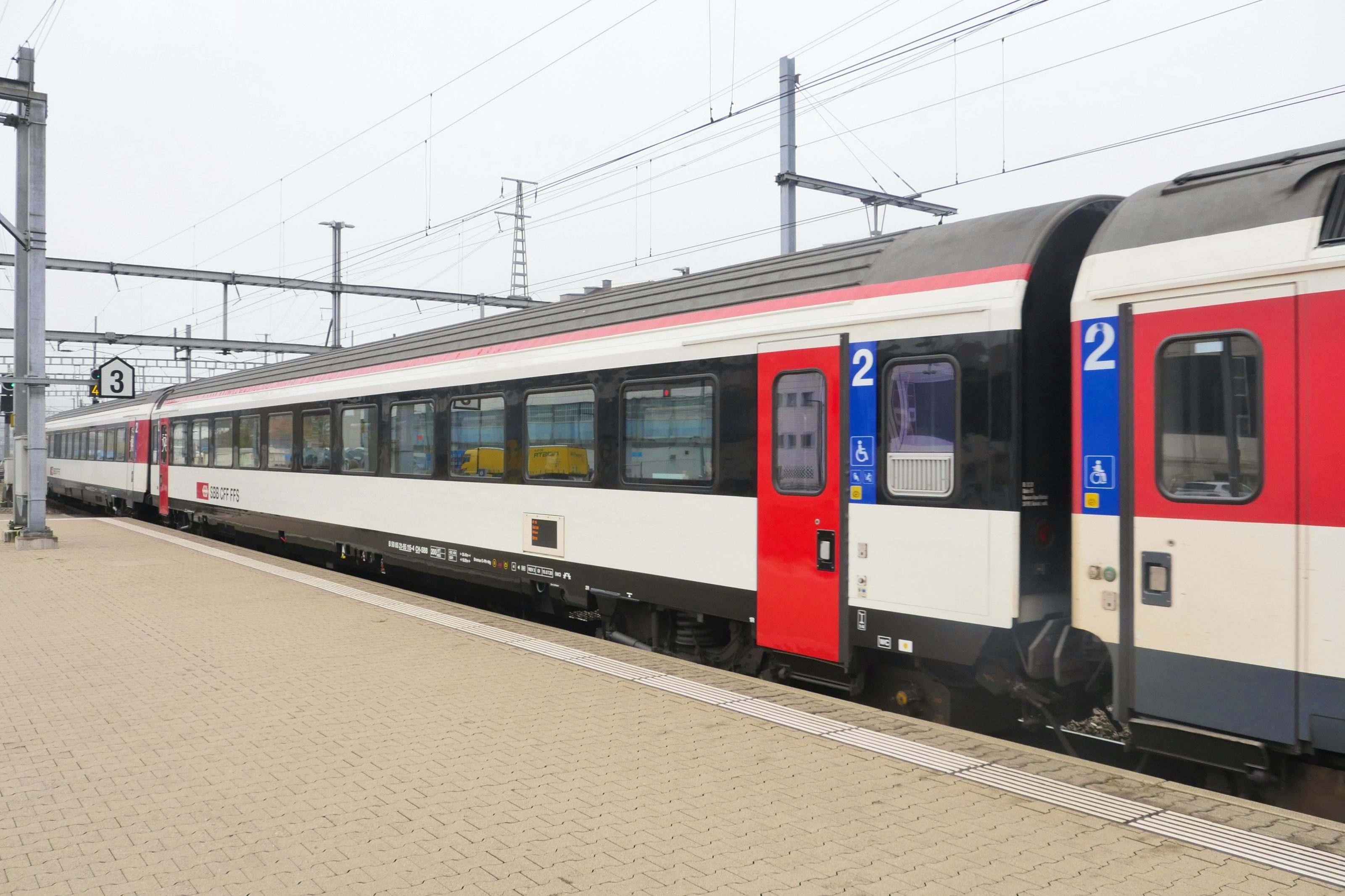 Exterior view of an SBB fan carriage.